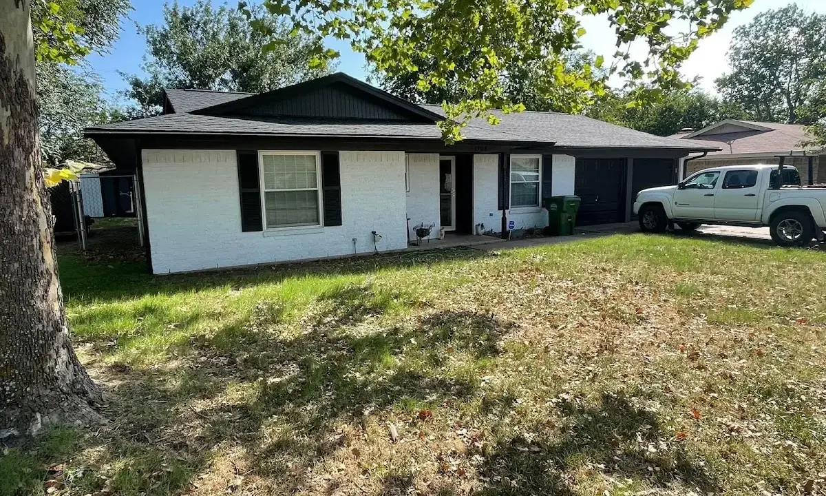 Professional roofing crew working on a residential roof in North Las Vegas